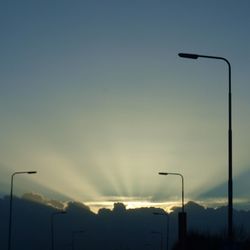 Low angle view of street light against sky