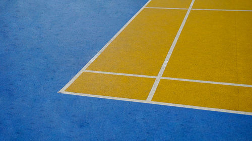 Close-up of yellow basketball court
