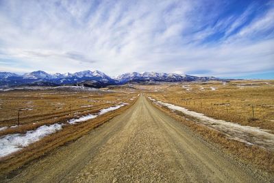 Gravel road to the crazy mountains in southwest montana outside of bozeman