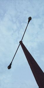 Low angle view of street light against sky