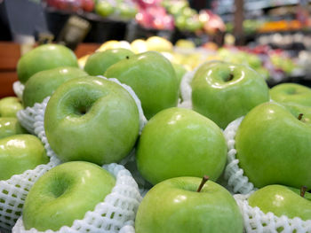 Close-up of apples for sale at market stall