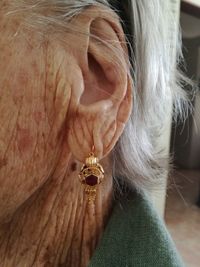 Close-up of woman ear with jewelry