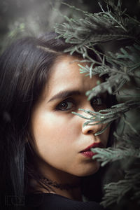 Close-up portrait of young woman