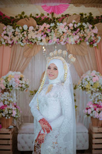 Portrait of woman with bouquet