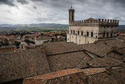 View of old town against cloudy sky