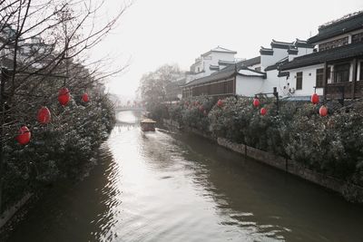 View of canal along buildings