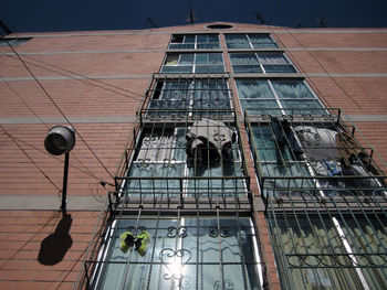 Low angle view of modern building against sky