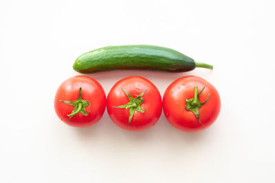 Close-up of bell peppers against white background