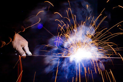 Firework display at night