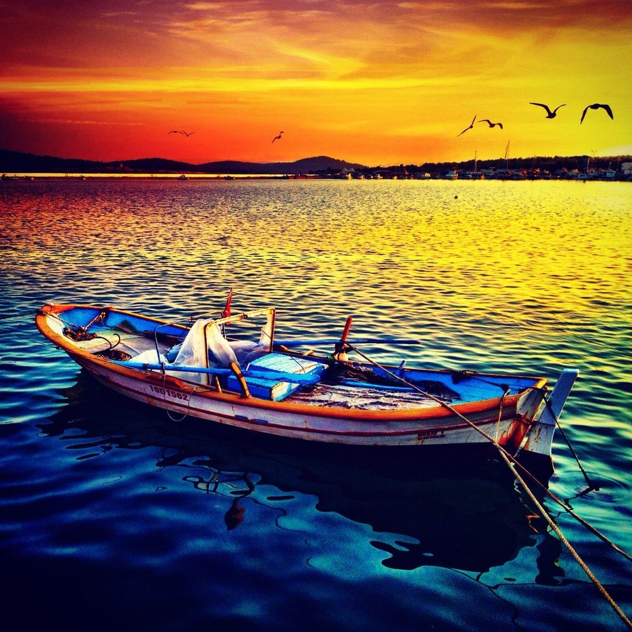 nautical vessel, boat, transportation, water, moored, mode of transport, sunset, reflection, tranquil scene, tranquility, sky, waterfront, scenics, lake, nature, travel, sea, beauty in nature, idyllic, dusk