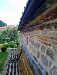 Tilt image of old building against sky