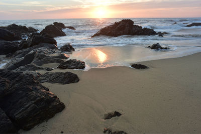 Scenic view of sea against sky during sunset