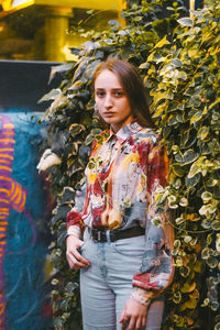 Portrait of woman standing outdoors