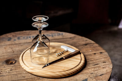 High angle view of upside down wineglasses on table