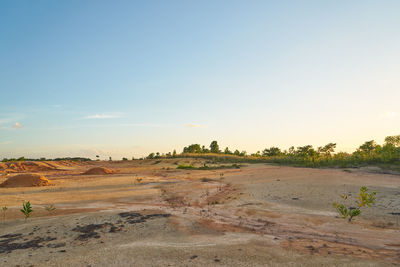 Scenic view of landscape against sky during sunset