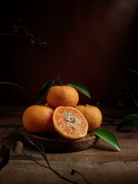 Close-up of orange fruits on table