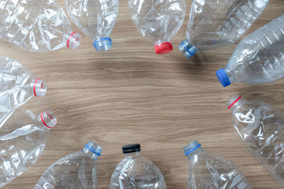 High angle view of empty bottles on table