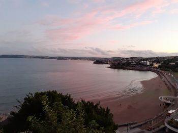 Scenic view of sea against sky at sunset