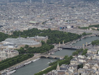 High angle view of river amidst buildings in city