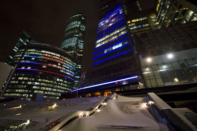 Low angle view of modern building at night