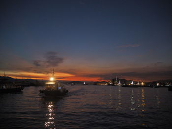 Scenic view of sea against sky at sunset