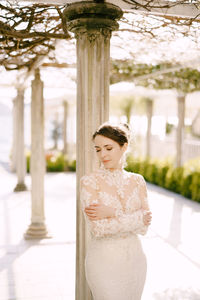 Portrait of bride holding bouquet