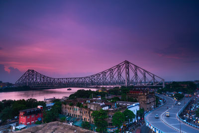 High angle view of bridge against cloudy sky