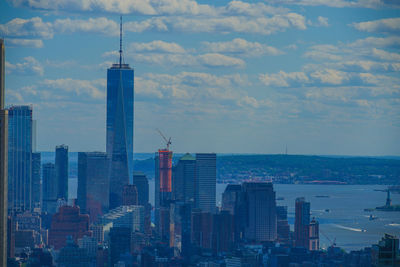 Modern buildings in city against sky