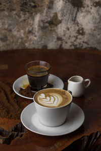 Coffee cup on table