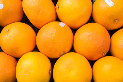 Full frame shot of oranges in market