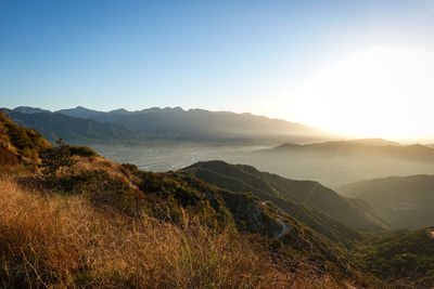 Scenic view of mountains against clear sky