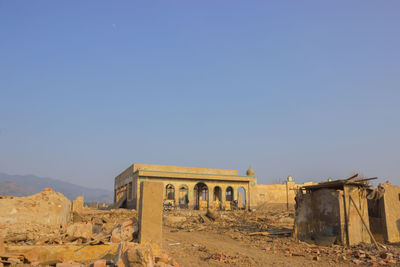 Low angle view of old ruins against clear sky