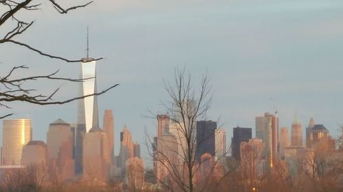 Modern buildings in city against sky