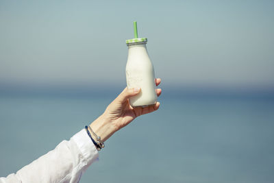 Close-up of a milk bottle against blurred background