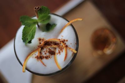 Close-up of drink served on plate