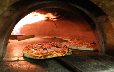 Close-up of pizza on table in restaurant