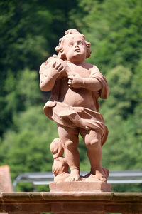 Angel, statue in the garden of cloister bronnbach in reicholzheim near wertheim, germany