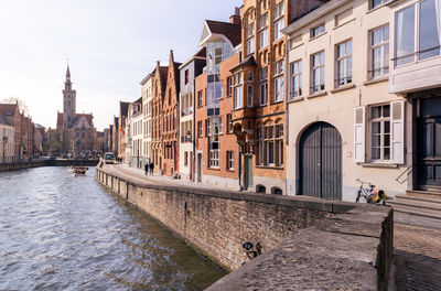 Canal passing through the old town of bruges