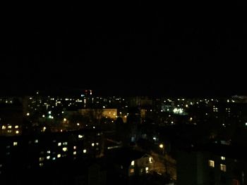 Aerial view of cityscape at night