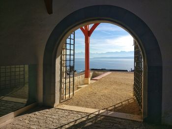 Scenic view of sea seen through building window