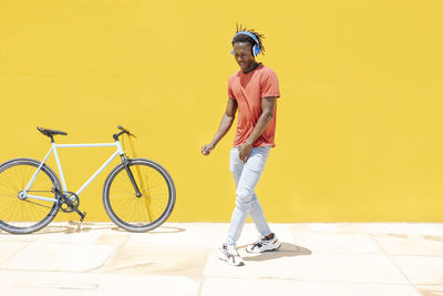 Black guy dancing on street