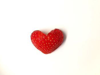 Close-up of heart shape over white background