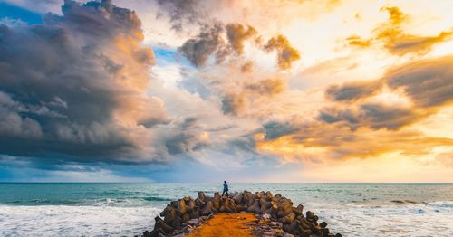 Scenic view of sea against sky during sunset