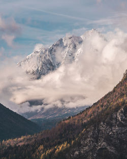 Scenic view of snowcapped mountains against sky