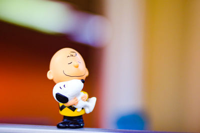 Close-up of figurine on table