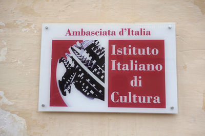 High angle view of information sign on table