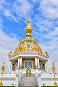 Low angle view of temple against building