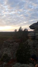 Scenic view of rocks against sky during sunset