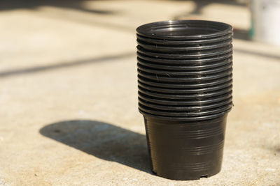 Close-up of black stack on table