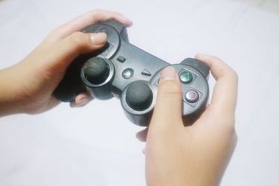 Midsection of person holding camera